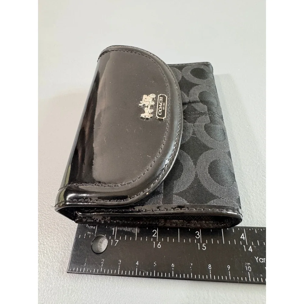 Coach Trifold Wallet Womens Black Signature Canvas Patent Leather Logo Plate